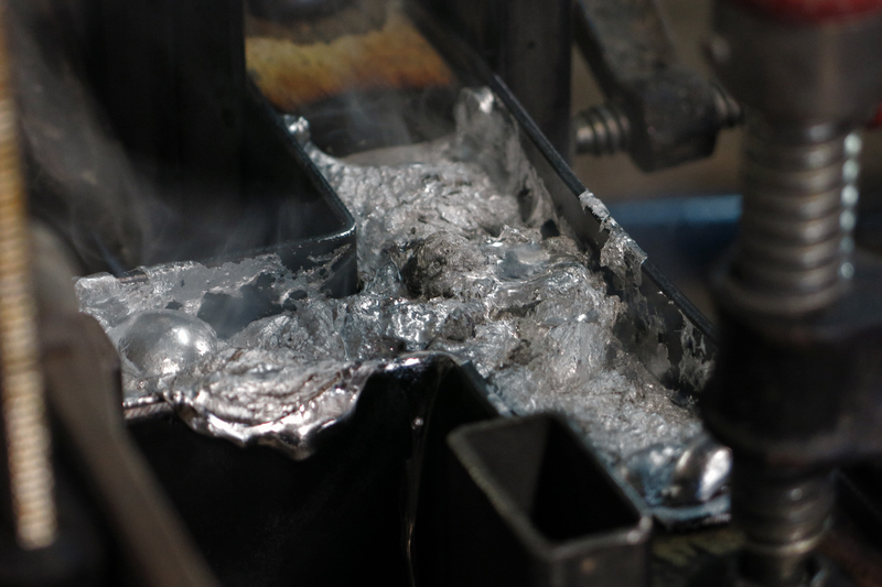 Illustration for article titled Casting Molten Metal On Wood With a Hungarian Design Master